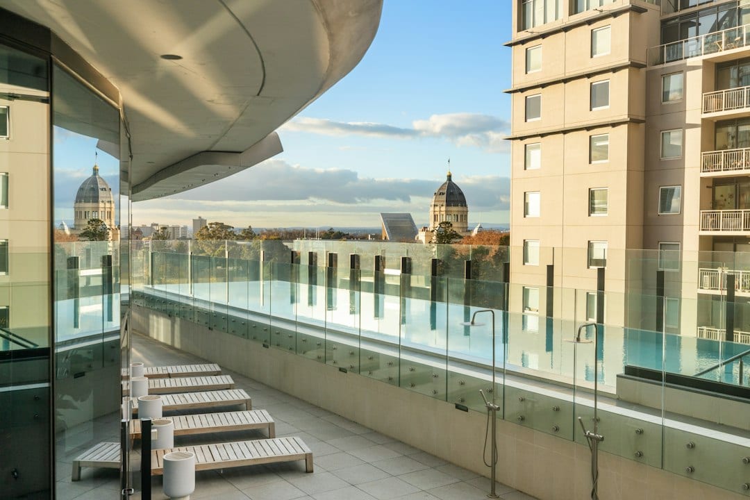 Infinity pool with city view at Riana Trees Residences